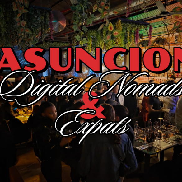 An image of a bustling pub with digital nomads and expats gathered at high-top tables in low lighting, engaged in conversation.