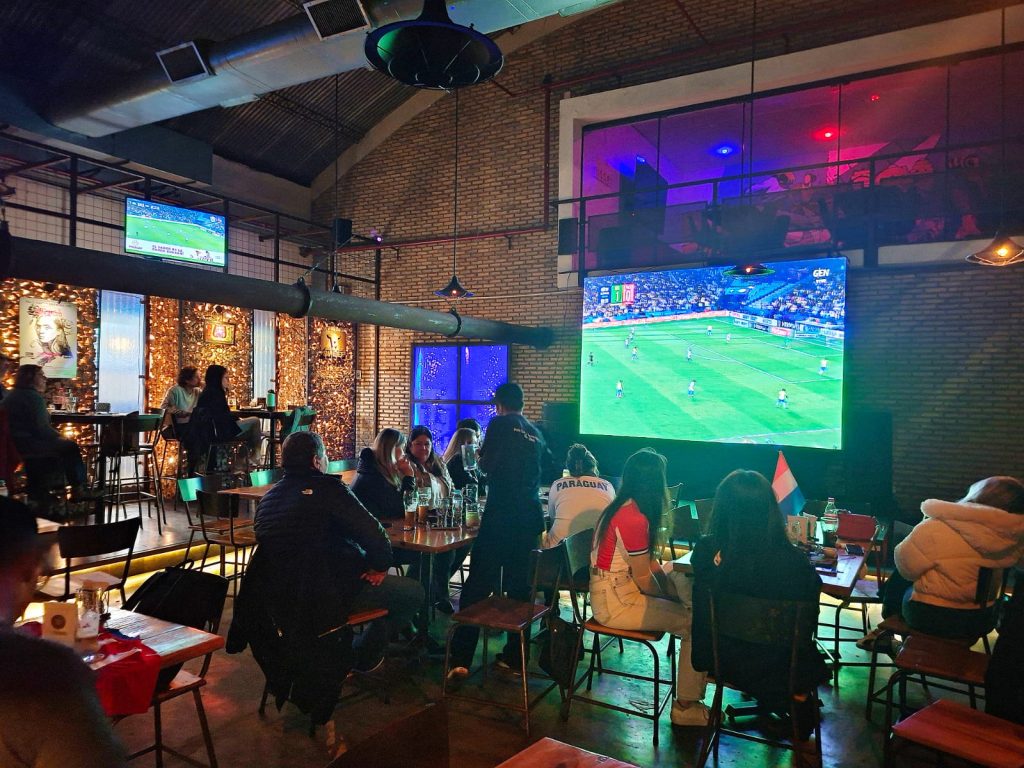 Fans at Palo Santo watching the Paraguayan National Team.