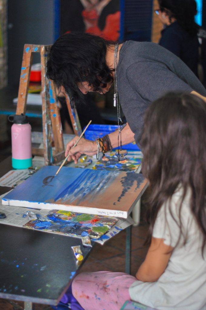 Porfirio Busto is giving art classes.