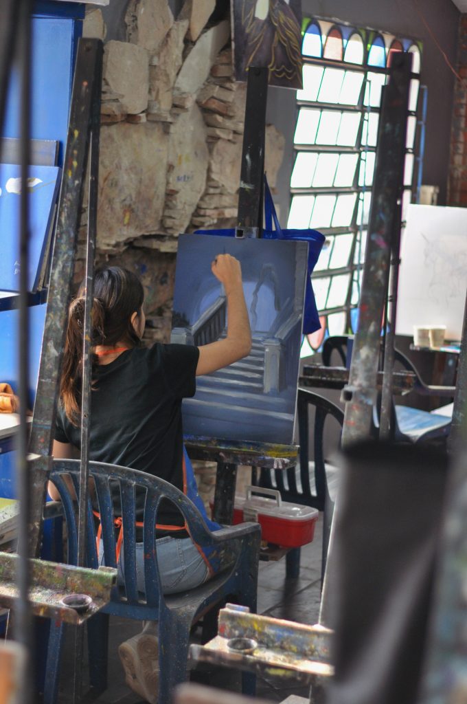 Porfirio Busto is giving art classes.